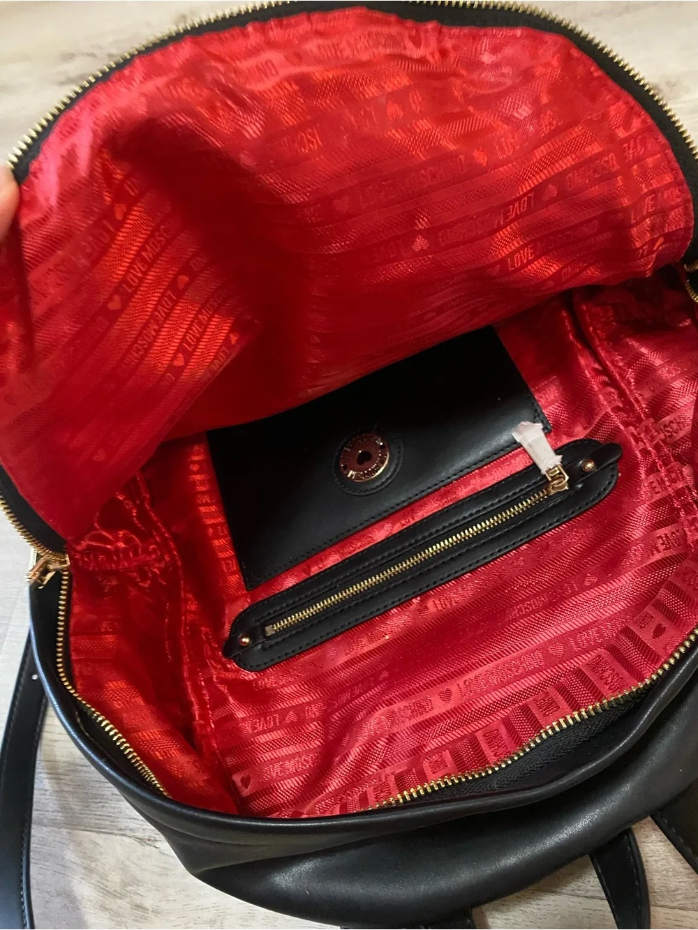Love Moschino Black Backpack with Gold Logo and Red Tassel